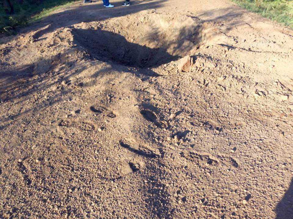 BurkinaFaso: The wreckage of the gendarmerie truck struck by IED and crater in the area of Nassougou, axis Ougarou-Boungou, Gourma   